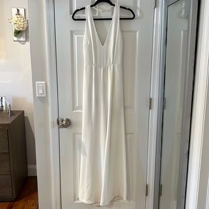 SMALL CARMELA DEEP V WIDE LEG BACKLESS JUMPSUIT IN WHITE